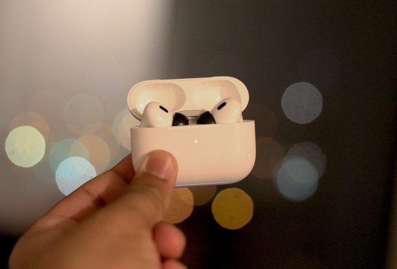 Homepage 2026 15 Close-up of memory foam ear tips fitted onto a pair of wireless earbuds