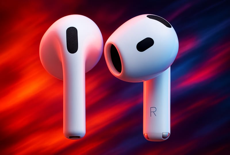Apple AirPods 5 open-ear earbuds shown beside their charging case