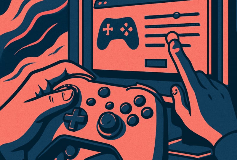 Homepage 2026 1 A gaming controller sitting next to a PC keyboard with a game settings menu visible on the monitor