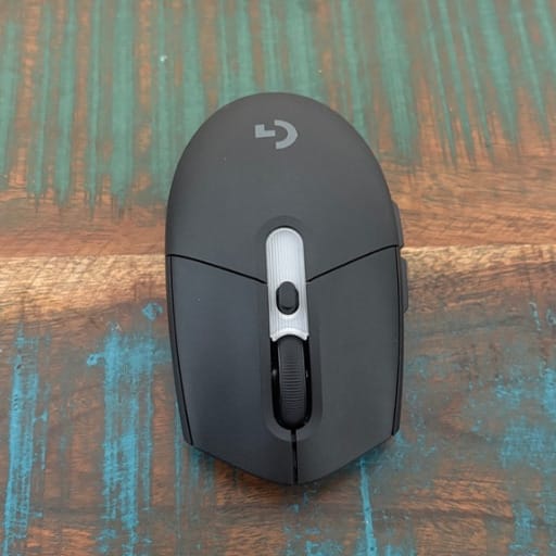 Black and white Logitech computer mouse top view