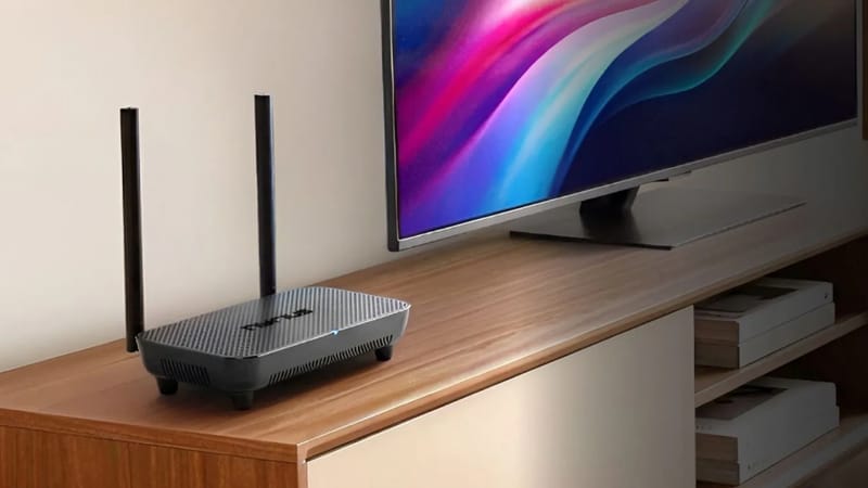 Nyrius Phoenix Home Beams 4K Video Without Any Cables 2 Nyrius Phoenix Home wireless HDMI transmitter and receiver used in a home theatre setup