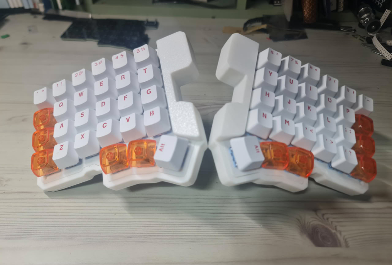 Homepage 2026 9 Silakka54 HE keyboard split halves showing Hall effect switches and thumb clusters