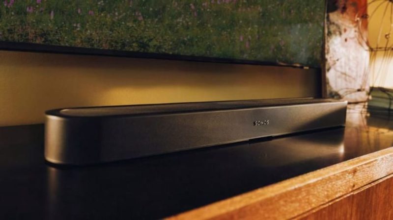 Sonos Beam Ultra soundbar and Ace Ultra headphones shown together against a plain background