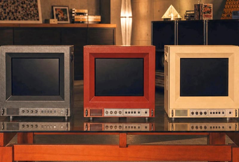 Unico Traveller ULW10 retro gaming monitor shown from the side with its rear storage compartment open