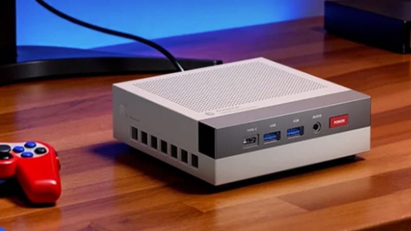 Acemagic Retro X3 mini PC in grey NES-inspired casing sitting on a desk