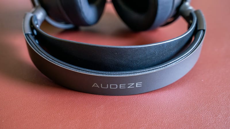 Bose headphones on a desk, representing a possible future Bose gaming headset