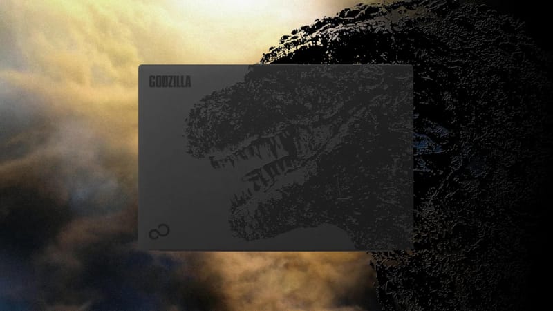 Fujitsu Godzilla laptop lid showing a black Godzilla illustration and dorsal fin shaped touchpad
