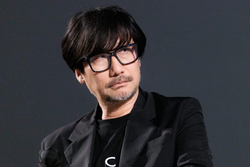 Konami Says AI Won't Drastically Change Game Development 1 Konami logo displayed beside text symbolising Konami AI game development comments from president Hideki Hayakawa