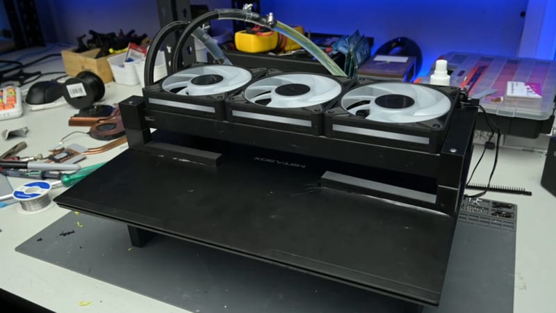 Modder Bolts 360mm AIO Radiator to a Gaming Laptop 1 Laptop AIO radiator mod showing external tubing and fans attached to a gaming laptop chassis