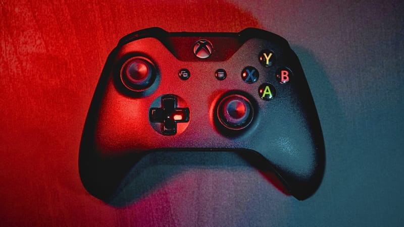 US Navy Laser Weapon System Now Fires With an Xbox Controller 1 Sailor holding an Xbox-style controller used to operate the Navy laser weapon system on a ship
