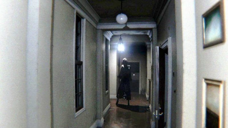 Major P.T. PC Port Revives Kojima's Cancelled Horror Game 3 Screenshot from the P.T. PC port showing the dark hallway from Hideo Kojima's cancelled Silent Hills teaser