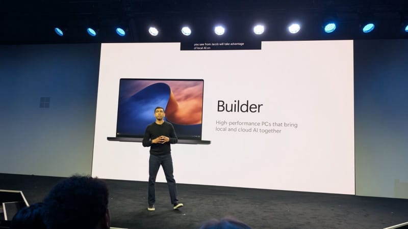 Nvidia and Microsoft executives presenting RTX Spark Builder PCs onstage at a joint keynote