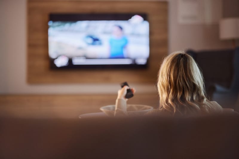Samsung Smart TV on a stand, illustrating concerns over Samsung Smart TV AI tracking of viewers